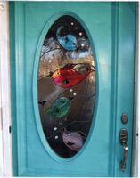 This front door panel had a cracked background.  The removal was a little tough but it was repaired and replaced.  The customer has a fish pond surrounding her property.