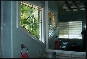 Leaded and beveled glass window in a bathroom