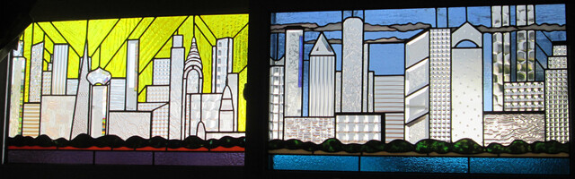 The artist's bedroom window, depicting a skyline including the World Trade Center, the Chrysler Building, the Transamerica Pyramid, and William Penn atop City Hall in Philly.